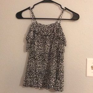 Off the shoulder, black and white top.